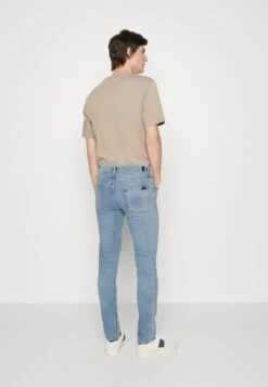 7 For All Mankind Slimmy Left Hand Crest - Vaqueros Tapered - Light Blue 7 7 For All Mankind Slimmy Left Hand Crest - Vaqueros Tapered - Light Blue -7 For All Mankind d844786810864530babca010ec8fa2b9